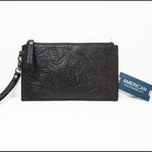 NWT | GENUINE LEATHER WRISTLET w/ PHONE CHARGER 📱